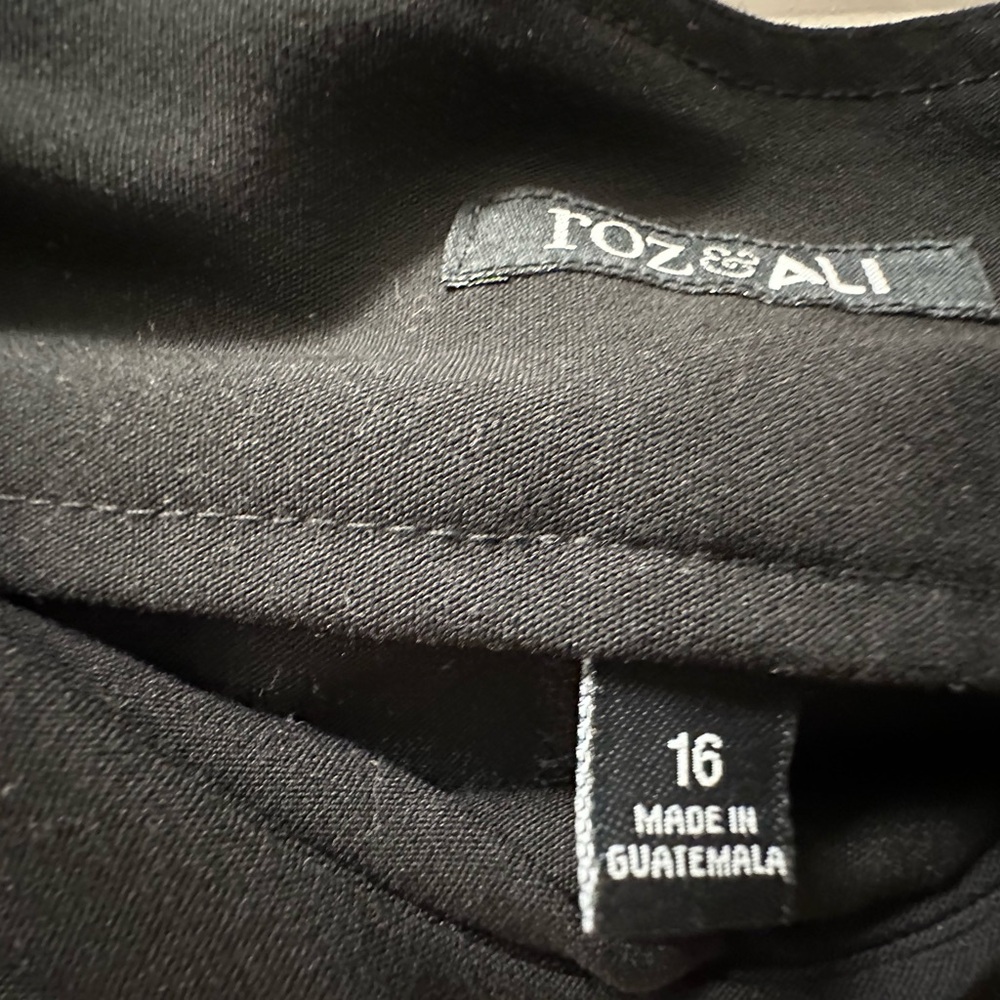 Roz and Ali pull on women’s slacks.